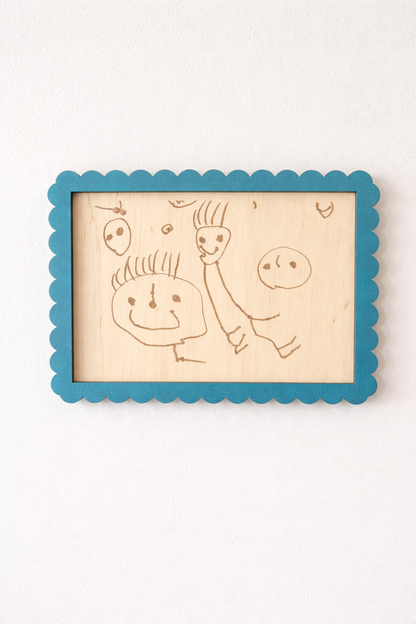 cadeau fête des mères ou fête des pères unique : un dessin de son enfant reproduit en gravure sur bois puis encadré 